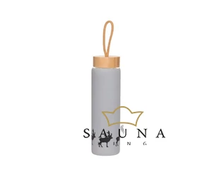 Glasflasche mit einem Rentiermotiv aus der Urheimat des Saunabadens, Finnland